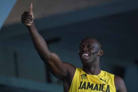 Usain Bolt é amante do futebol, mas também é rápido na resposta sobre o duelo Cristiano Ronaldo x Messi – Foto: (Foto:JOHANNES EISELE/AFP/Lancepress!)
