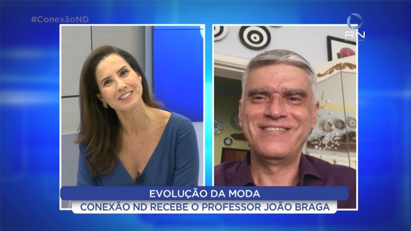 A jornalista M&aacute;rcia Dutra recebe o professor Jo&atilde;o Braga – Foto: NDTV