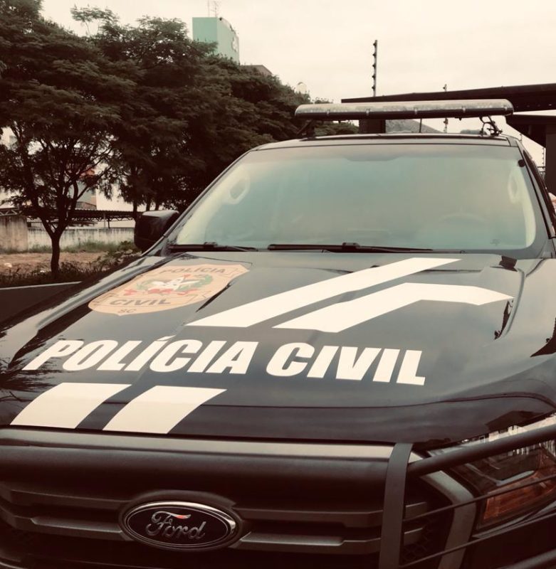 A civilian police vehicle with an emphasis on the front of the vehicle.