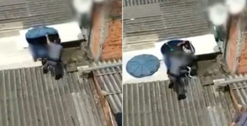 Homem se esconde de policiais dentro de caixa d’&aacute;gua – Foto: Reprodu&ccedil;&atilde;o /Record TV