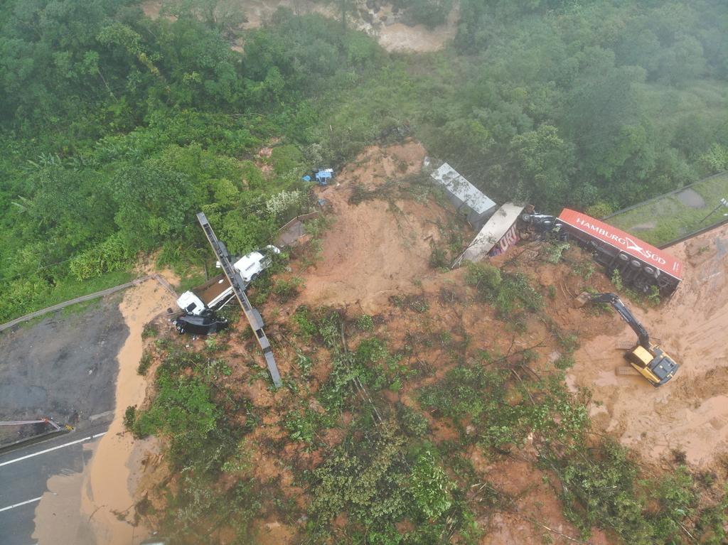 Cars were buried and trucks swept away by the force of the landslide - Government PR/Disclosure