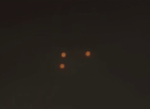 This photo was taken in May 2022 in Florianopolis, in the north of the island.  This was recorded by a couple of tourists who visited the island.  It was about 9 pm when they saw an object appearing over the sea and slowly moving towards the mainland, without making any noise, the lights were recorded.  They reported that other people also noticed the object.  In the same month, we also received reports from witnesses who saw an object with the same characteristics in the Governador Celso Ramos area.  - GPUSC/Disclosure/ND