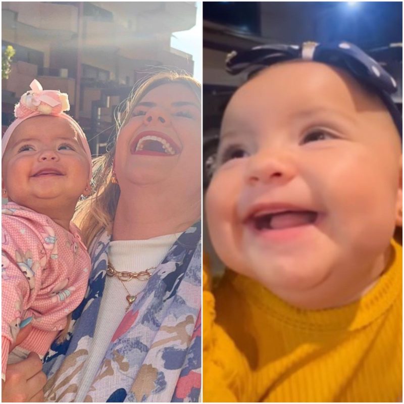 Bebê apaixonada por placas de estacionamento 