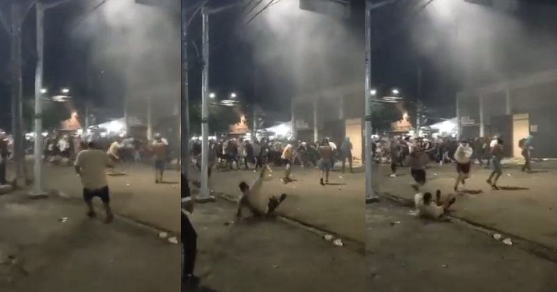 Torcedor tenta arremessar copo, escorrega e derruba líquido nele mesmo