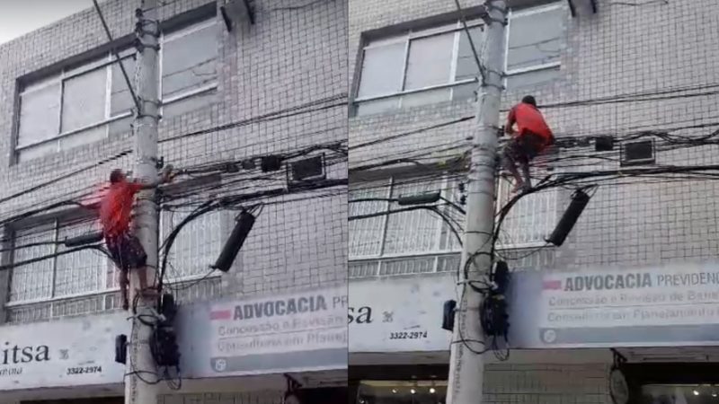 Homem retira cabos em Florianópolis