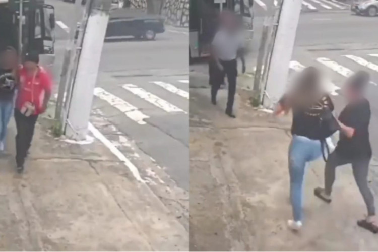 Mulher que foi vítima de tentativa de estupro sendo levada por outra mulher até o ônibus novamente 
