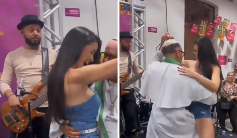 Padre agarra mulher e dança colado. Na cena é possível ver os dois dançando enquanto o baixista que toca no momento assiste a cena chocado