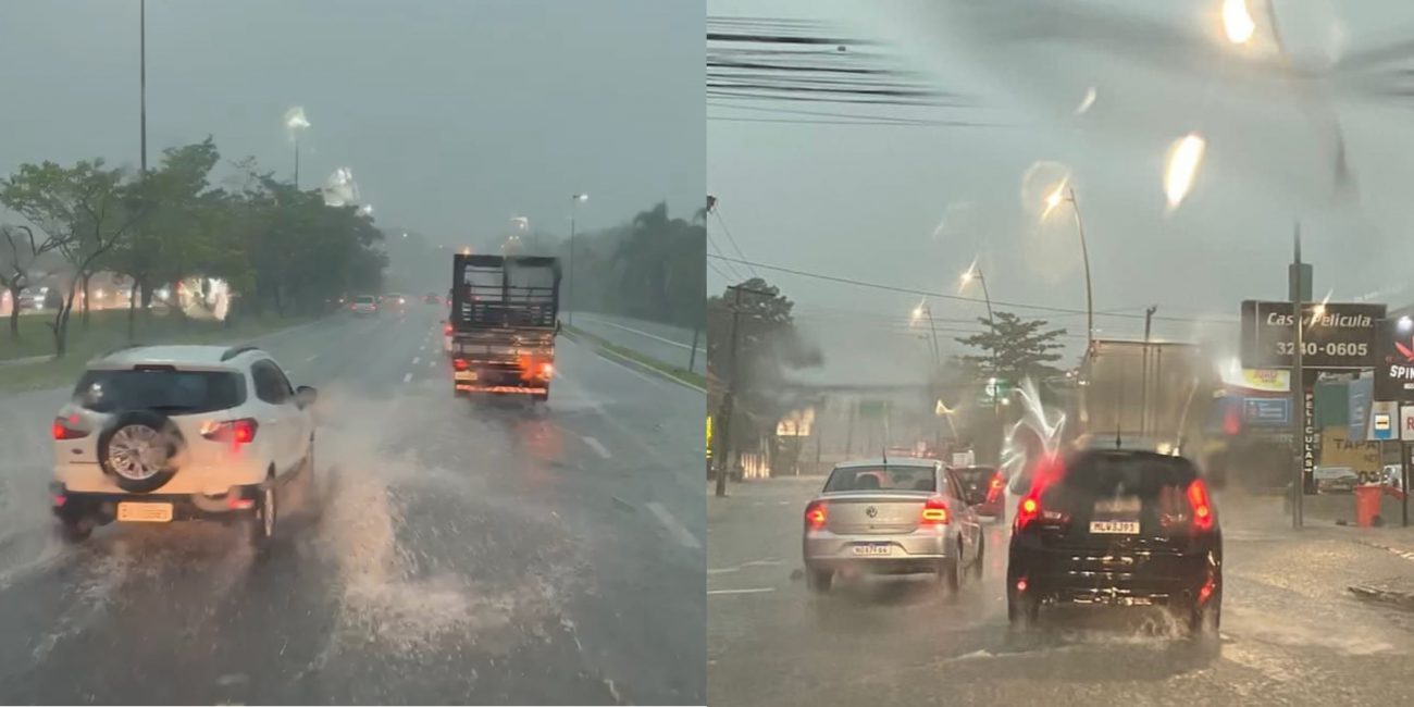 na foto é possível ver o trânsito, com alguns carros trafegando em uma pista com acúmulo de água sobre o asfalto