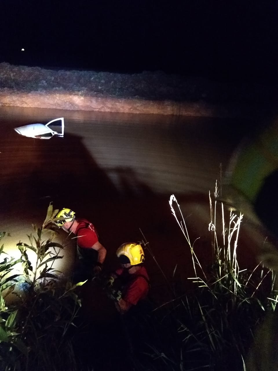 The vehicle went off the road and fell into a flooded area next to the road, submerging under water up to the ceiling.  - Military Fire Department/Reproduction/ND