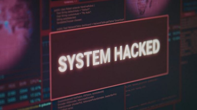 System hack alert translated into English on laptop screen