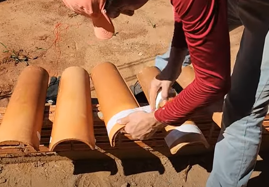 Dica com telha feita por pedreiro