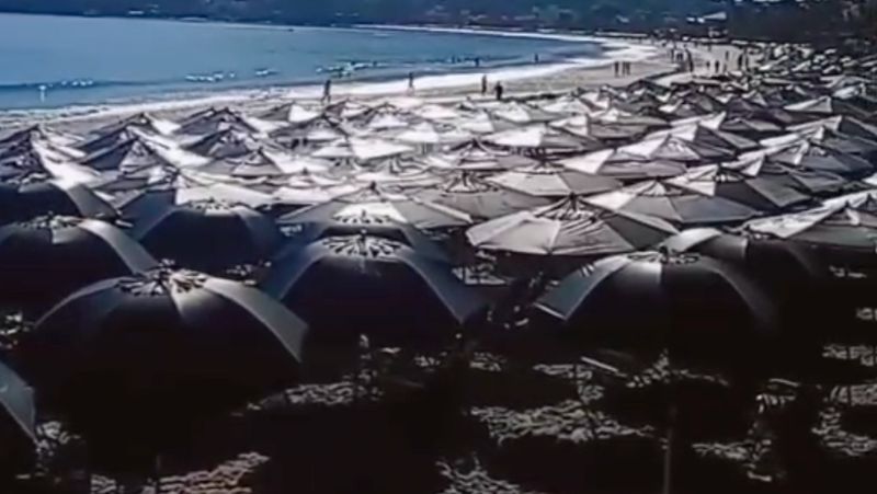 V&iacute;deo mostra praia sem espa&ccedil;o por conta de cadeiras e guarda-s&oacute;is vazios – Foto: Reprodu&ccedil;&atilde;o/ND