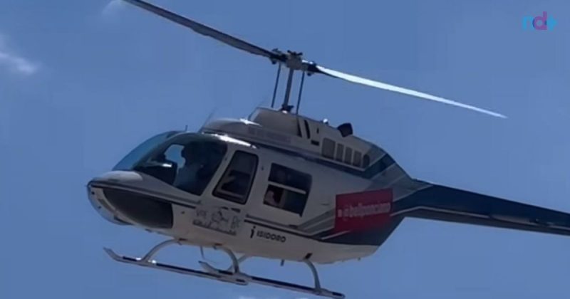 Imagem mostra helicóptero usado por mulher que fez "chuva de dinheiro" em Balneário Camboriú
