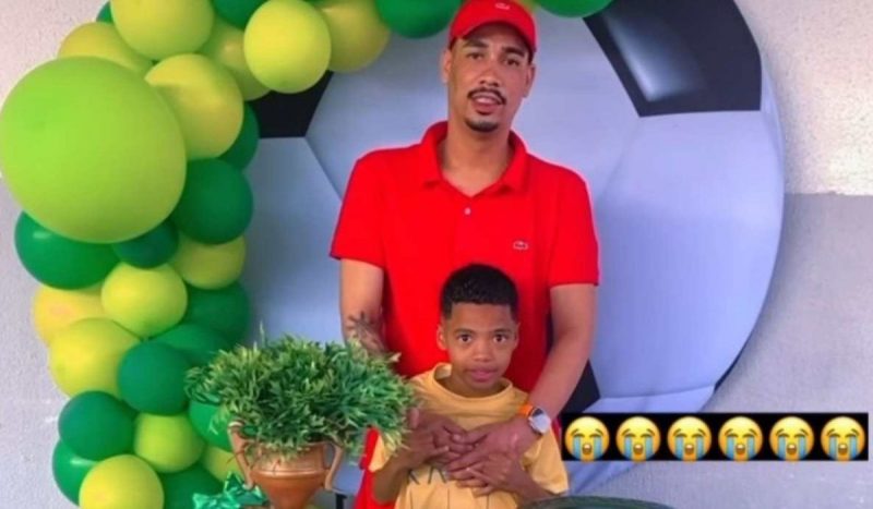 Foto mostra Felipe Júnior Moreira Lima e abraçado ao filho, Heitor Felipe, vítimas da chacina