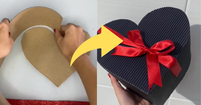 Caixa de presente para o Dia das Mães em formato de coração preta com um laço vermelho 