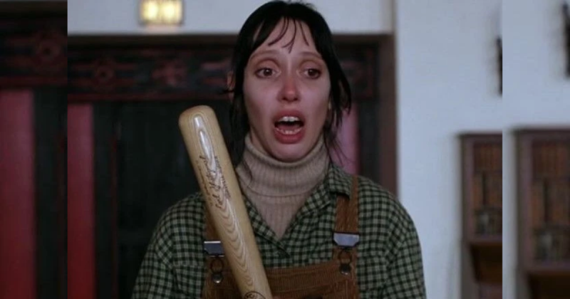 Shelley Duvall segurando um taco de beisebol
