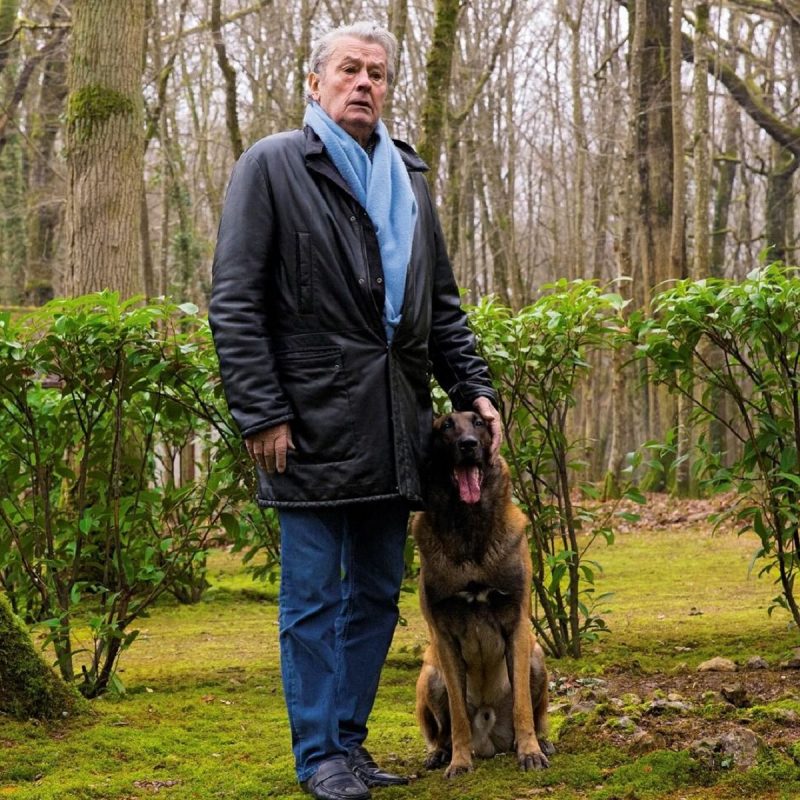 Registro de Alain Delon junto ao seu cachorro, Loubo em uma floresta