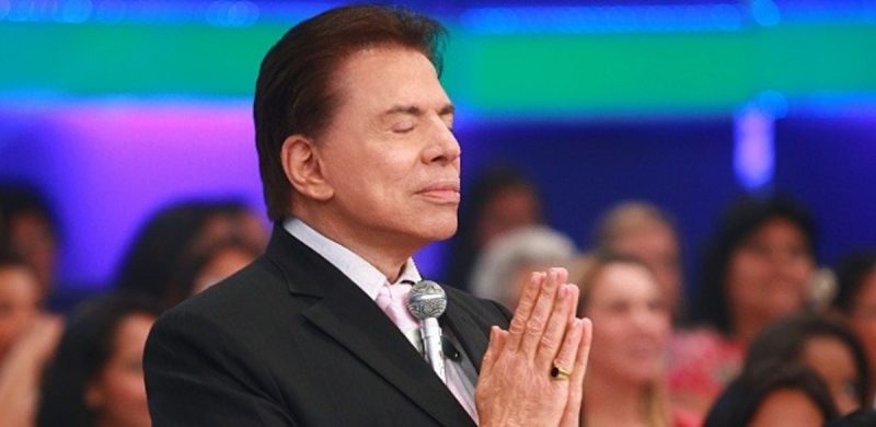 Silvio Santos rezando