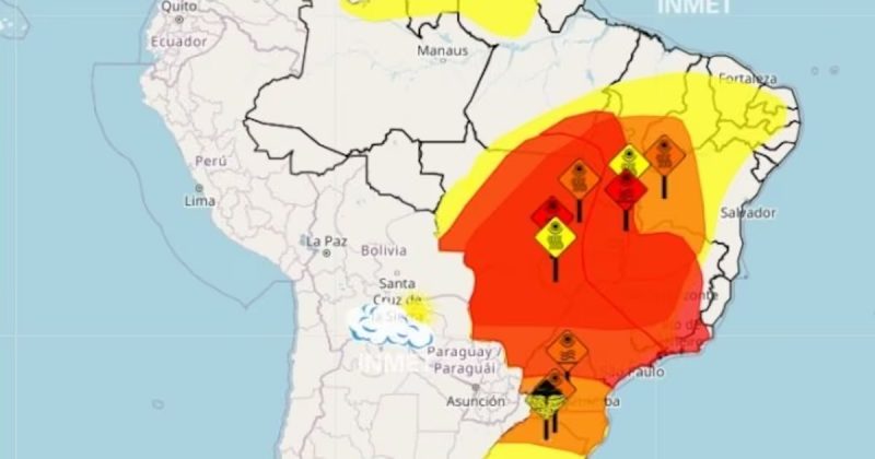 Mapa do Brasil com manchas nas cores amarela, laranja e vermelha, representando os sistemas de alerta 