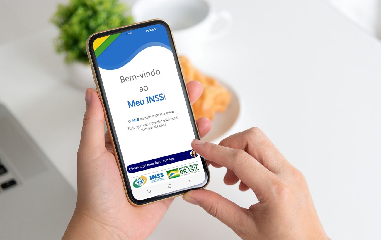 INSS passa a exigir biometria facial para conceder empréstimo consignado INSS passa a exigir biometria facial para conceder crédito consignado. Na imagem, um celular com o aplicativo Meu INSS na tela