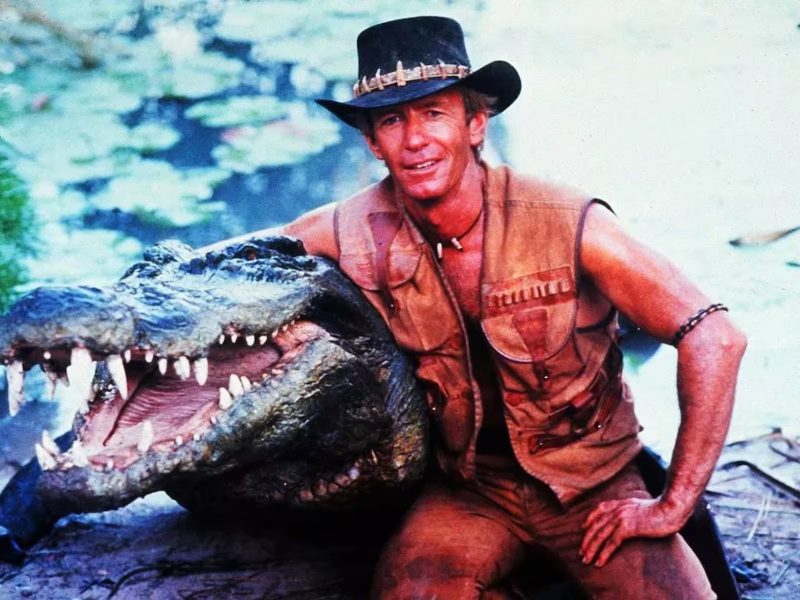 Estrelas de Crocodilo Dundee em foto promocional para o filme 