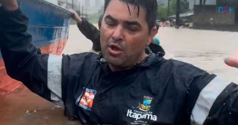 imagem mostra prefeito de Itapema debaixo d'água