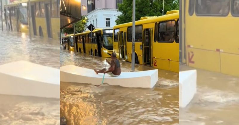 Homem usa isopor como canoa em meio a alagamentos