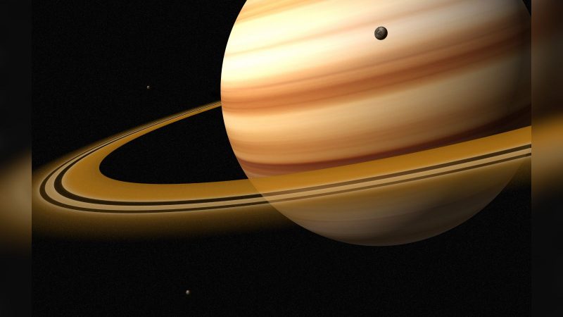 Imagem de saturno com lua próxima