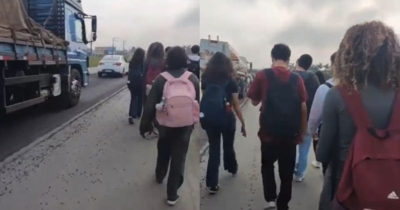 Alunos se arriscam em acostamento de rodovia para chegar a colégio de Araquari em dia de caos na BR-280 Alunos se arriscam em acostamento da BR-280 em Araquari (SC)