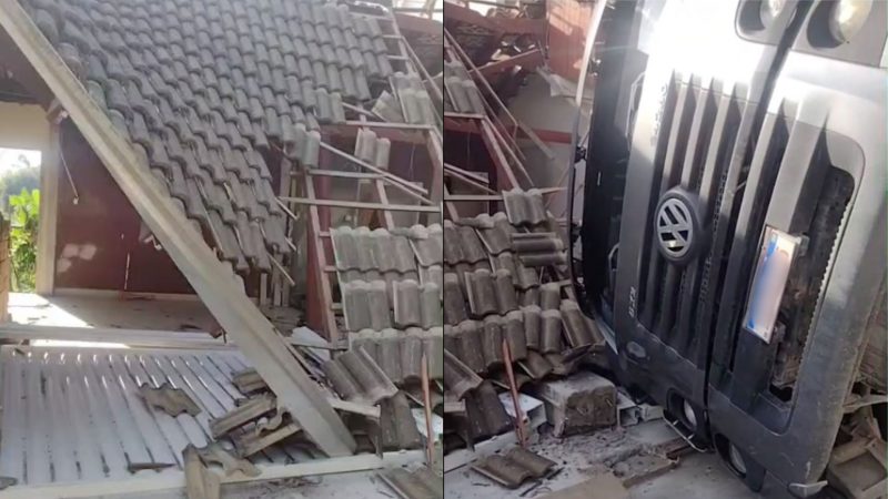 Caminhão tombado Foto mostra caminhão tombado e telhado destruído