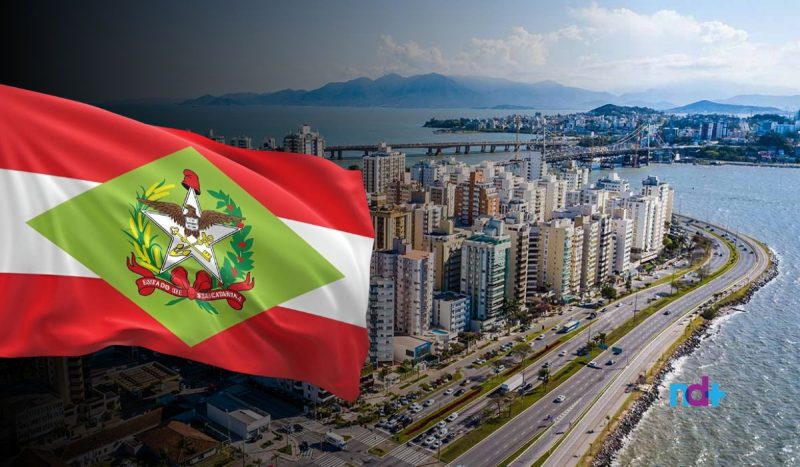 Montagem da vista de Florianópolis com a bandeira de Santa Catarina Santa Catarina tem o terceiro maior rendimento per capita do Brasil