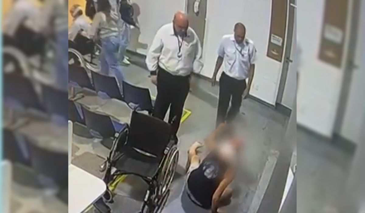 Paciente em cadeira de rodas é agredido por segurança de hospital em SP Paciente em cadeira de rodas é agredido por segurança de hospital em SP. Na imagem, o momento da agressão, com o paciente já caído