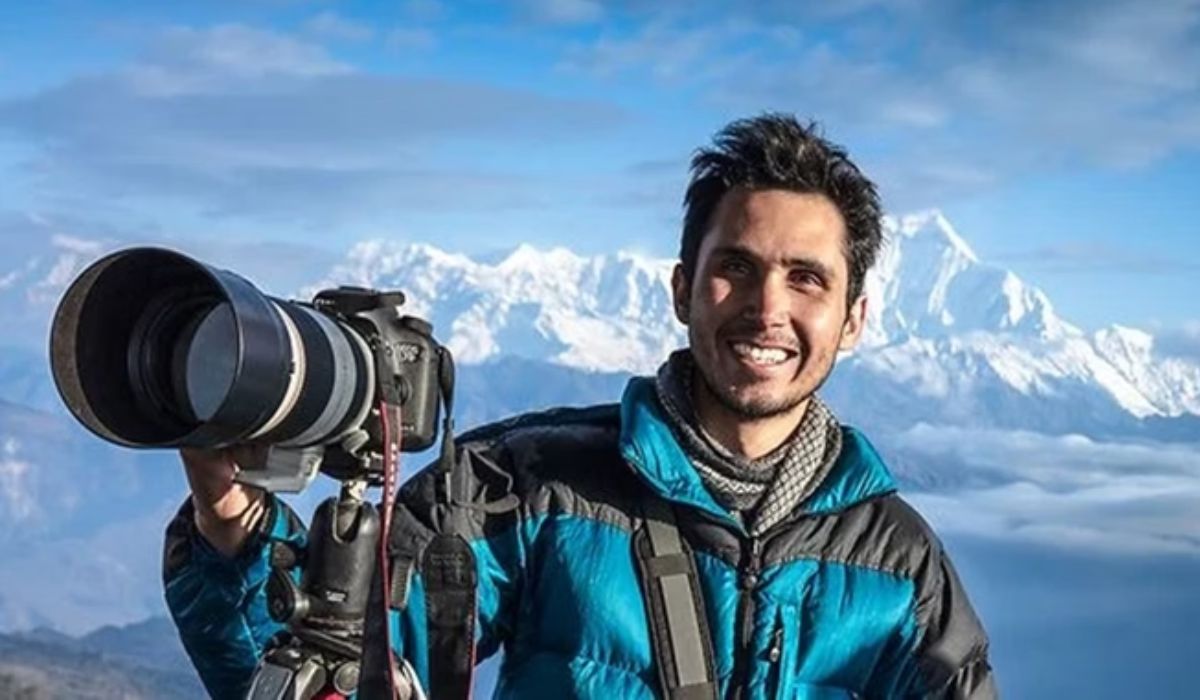 Montanhista brasileiro com câmera