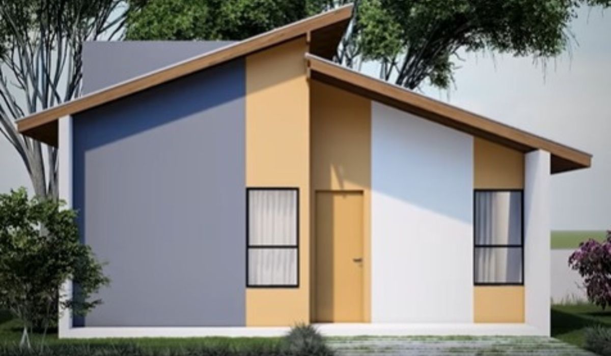 SC vai construir 1,2 mil casas populares em 106 municípios, foto mostra casa com uma porta, duas janelas, pintada de cinza, creme e branco