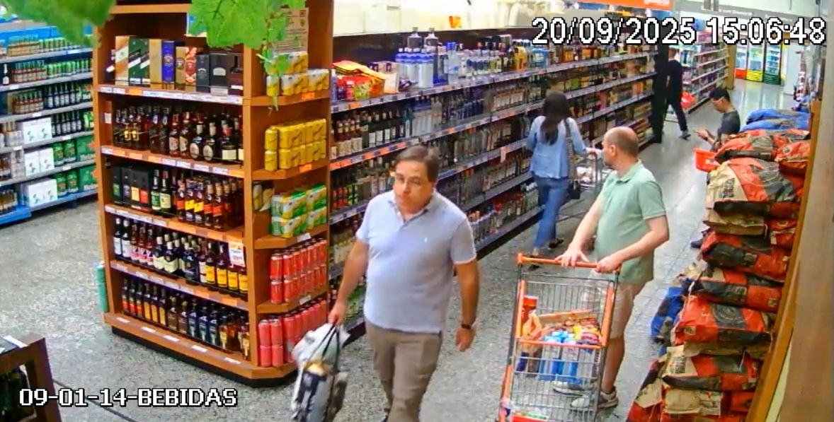 contioutra.com - V&iacute;deo flagra juiz da Opera&ccedil;&atilde;o Lava Jato levando champanhe sem pagar em mercado