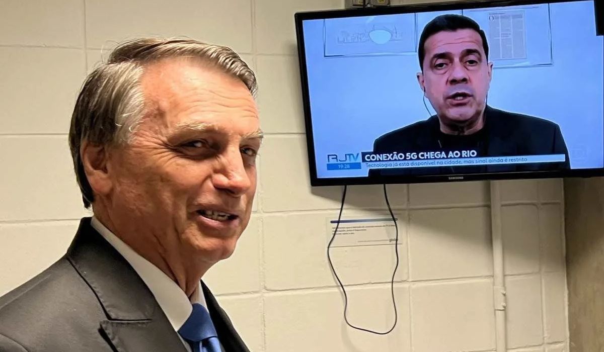 O catálogo infinito do streaming deu lugar à grade fixa das emissoras tradicionais na TV de Bolsonaro na prisãoFoto: Reprodução/ND
