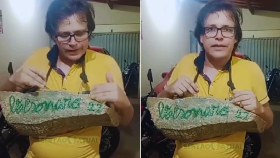 ‘Estou torto’: bolsonarista carrega pedra de 25 kg no pescoço em caminhada com Nikolas Ferreira