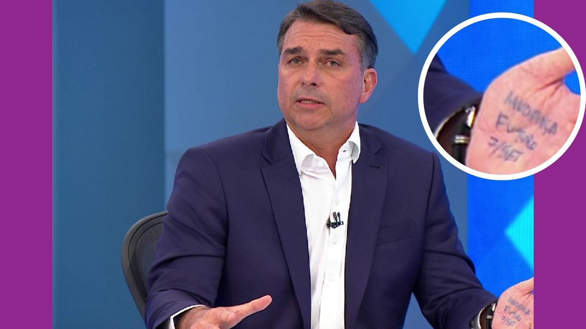 Flávio Bolsonaro imita o pai e leva ‘colinha’ na mão para sabatina em rede nacional; confira o que está escrito - QTU Questões do Universo
