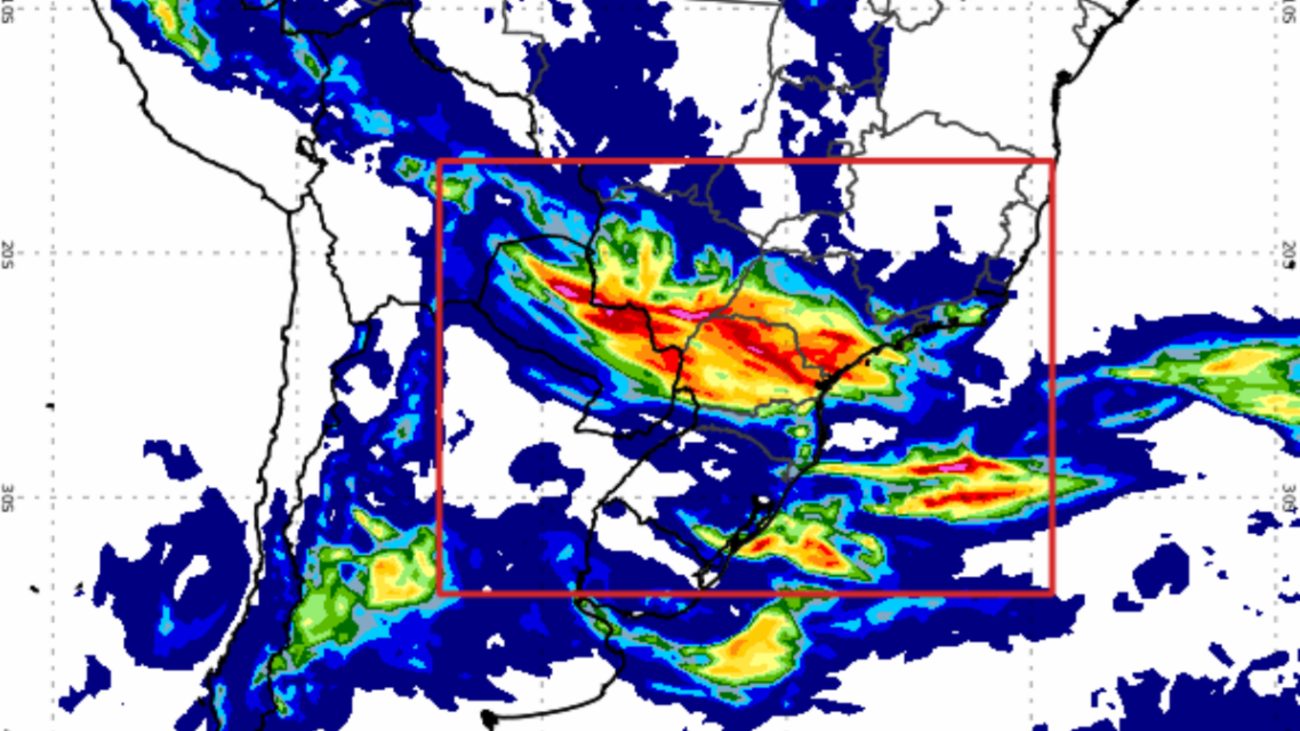 Mapa meteorológico destaca áreas com previsão de chuva forte em partes do Brasil, com faixas coloridas que indicam diferentes volumes de precipitação.